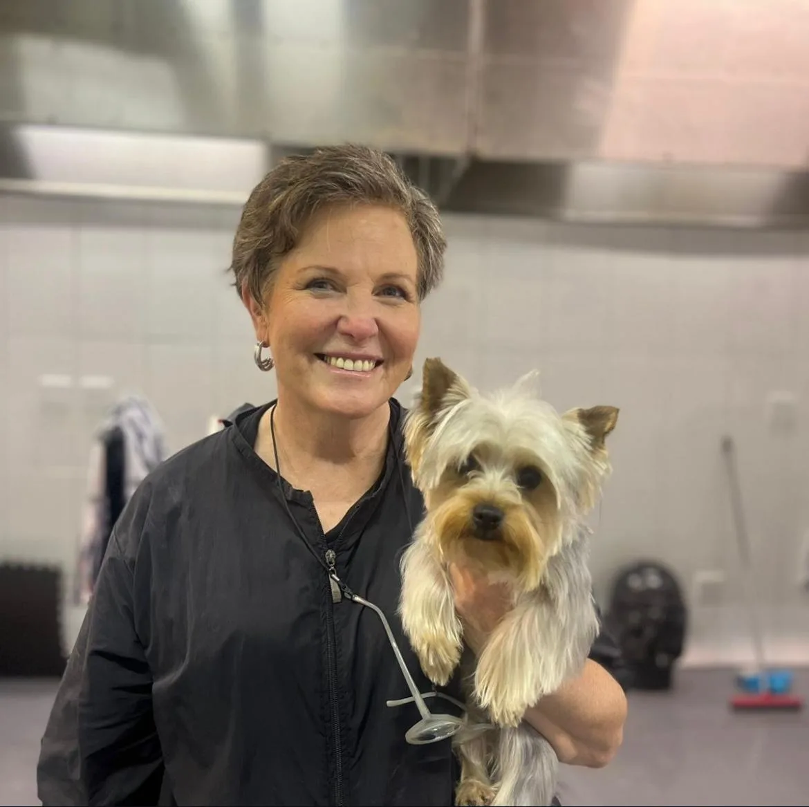Erika with a freshly groomed Yorkie